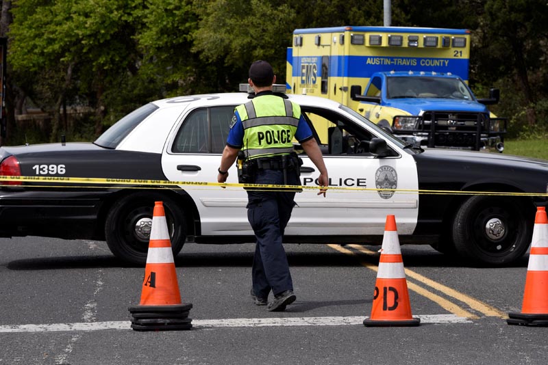 REFILE - Members of Austin Police Department block off part of Republic of Texas Boulevard following an explosion in Austin, Texas, US, March 19, 2018. Photo: Reuters