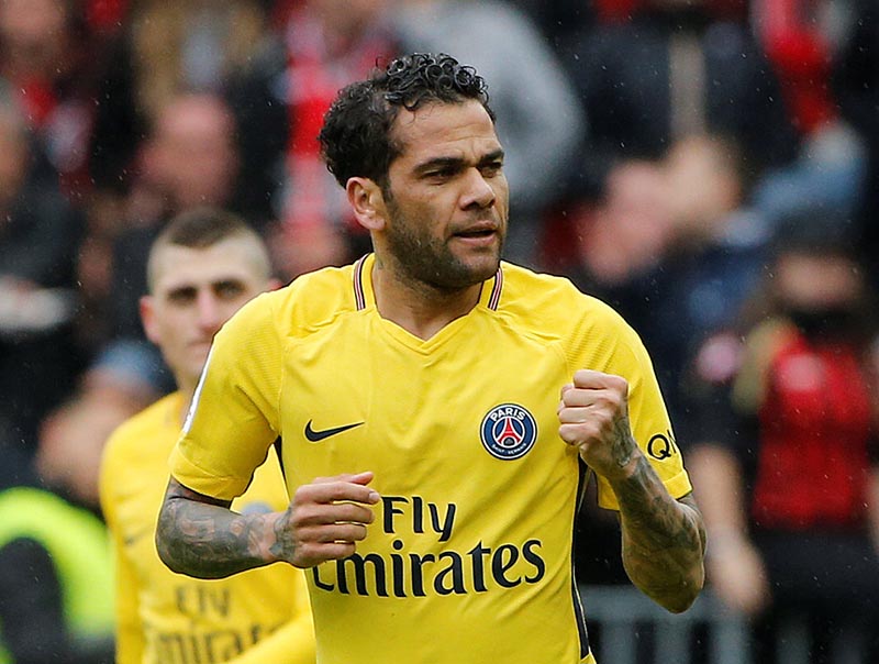 Paris Saint-Germainu2019s Dani Alves celebrates scoring their second goal during the French Ligue 1 match between OGC Nice and Paris Saint Germain, at Allianz Riviera, in Nice, France, on March 18, 2018. Photo: Reuters