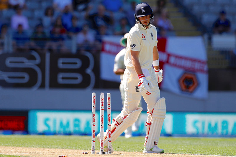 England's Joe Root reacts after being bowled during the first day of the first cricket test match. Photo: Reuters