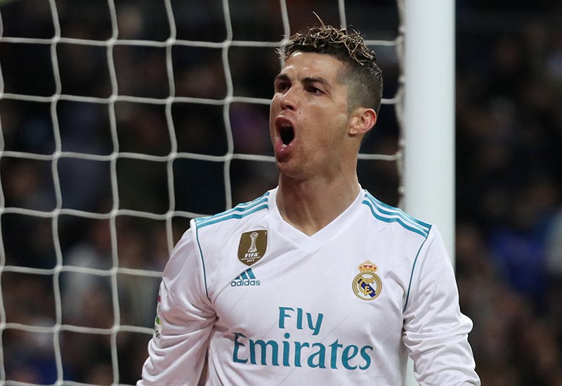 Real Madrid's Cristiano Ronaldo celebrates scoring their fourth goal during the La Liga Santander Match between Real Madrid and Girona, at Santiago Bernabeu, in Madrid, Spain, on March 18, 2018. Photo: Reuters