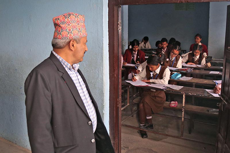 Minister for Education Giriraj Mani Pokharel inspecting an exam centre in Baneshwor, Kathmandu on Thursday. Photo: RSS