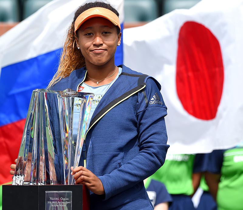 Naomi Osaka (JPN) with the championship trophy after she defeated Daria Kasatkina (not pictured) in the women's finals in the BNP Paribas Open at the Indian Wells Tennis Garden, in Indian Wells, California, USA, on March 18, 2018. Photo: Jayne Kamin-Oncea-USA TODAY Sports via Reuters