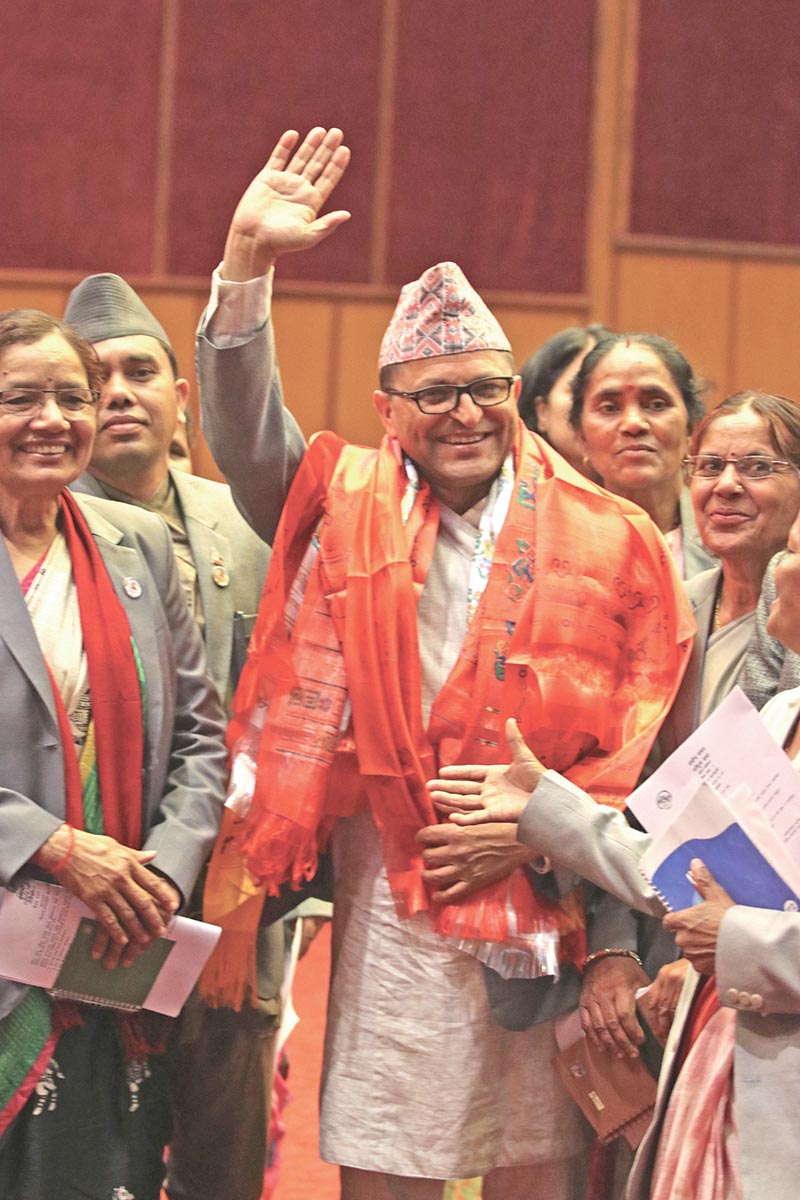 National Assembly Chairperson Ganesh Timilsina waving to supporters after his election to the post, in Kathmandu, on Wednesday, March 14, 2018. Photo: RSS