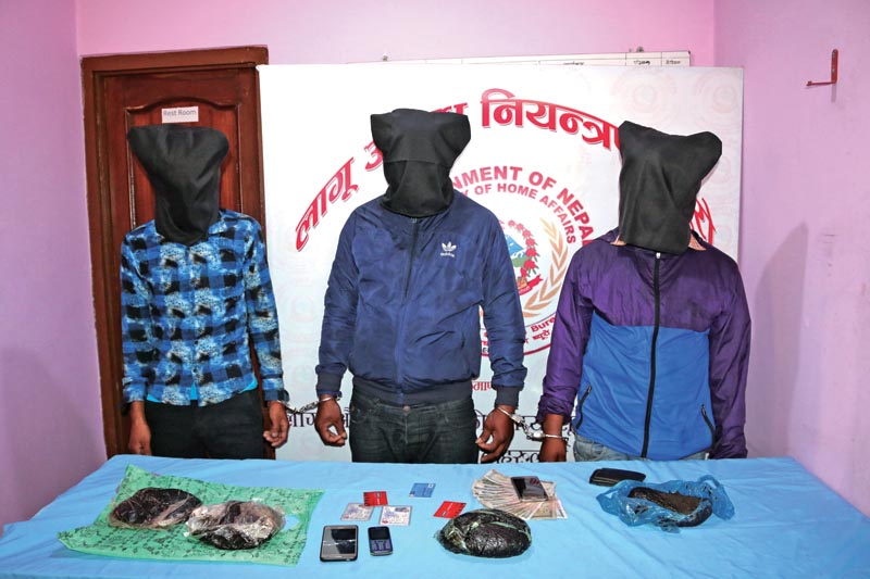 Opium smugglers being made public at Narcotics Control Bureau, in Kathmandu, on Tuesday, March 20, 2018. Photo: THT