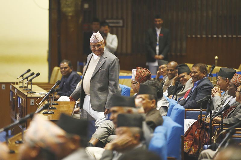 Prime Minister KP Sharma Oli is all smiles after winning the vote of confidence with over two-thirds majority in the House of Representatives at the Federal Parliament, in Kathmandu, on Sunday, March 11, 2018. Photo: Skanda Gautam/THT