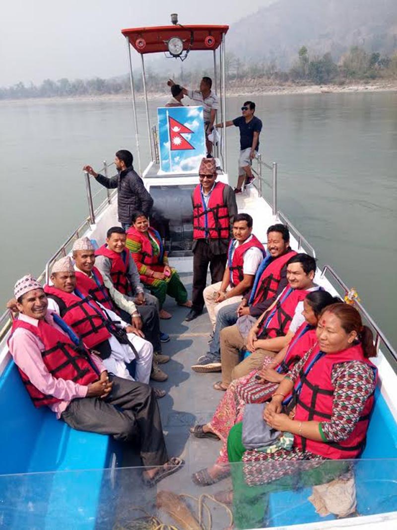People enjoying a boat ride in the Saptakoshi River in Gaighat, Udayapur, on Sunday, March 25, 2018. Photo: THT
