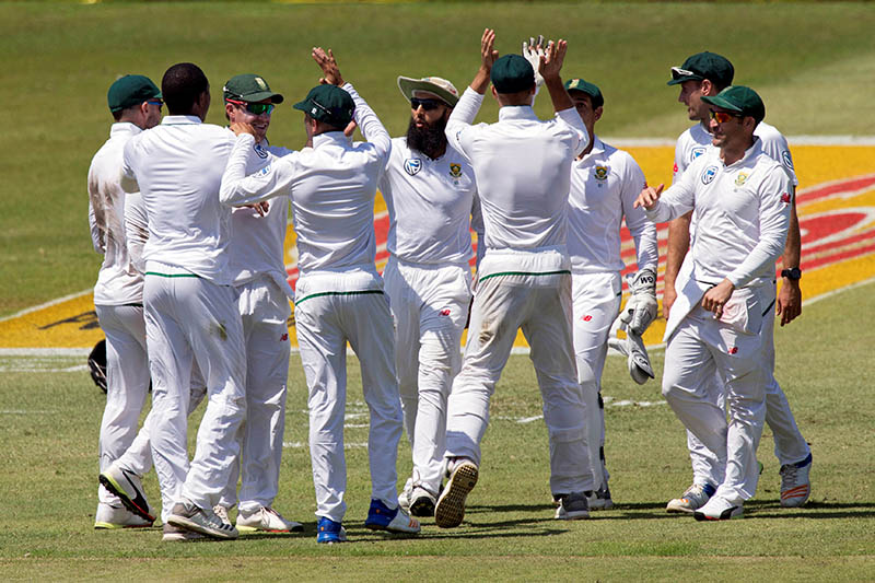 South Africa celebrate the wicket of Australia's Usman Khawaja. Photo: Reuters