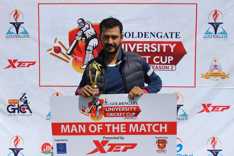 Man-of-the-match Subash Khakurel of TU holds the trophy after their victory over Cosmos College in the Golden Gate University Cricket Cup match in Kathmandu on Friday, March 16, 2018. Photo: THT