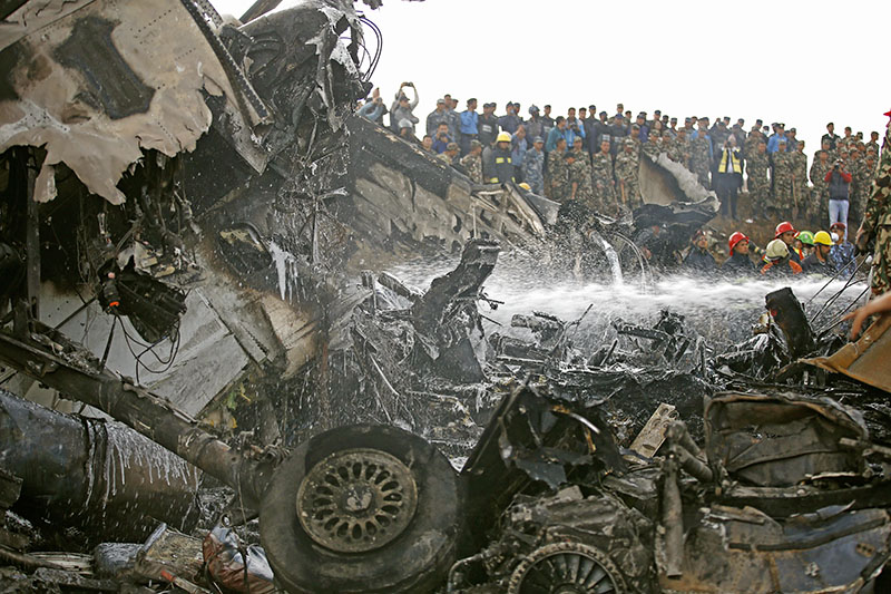 The wreckage of US-Bangla BS-211 aircraft, in Tribhuvan International Airport, Kathmandu, on Monday, March 12, 2018.Photo: Skanda Gautam/THT