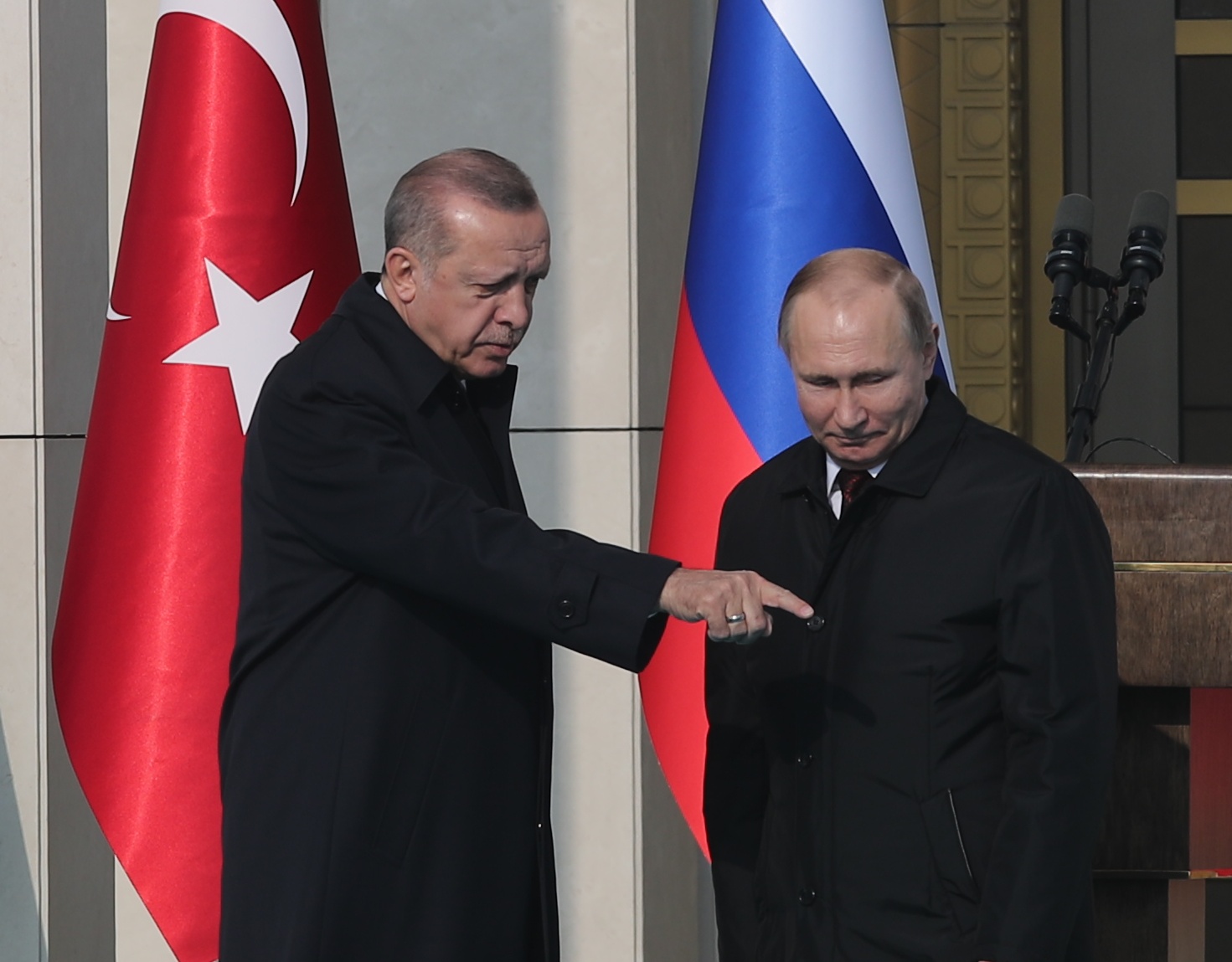Turkish President Tayyip Erdogan and his Russian counterpart Vladimir Putin attend groundbreaking ceremony of the Akkuyu Nuclear Power Plant through videolink, at the Presidential Palace in Ankara, Turkey April 3, 2018. REUTERS/Umit Bektas