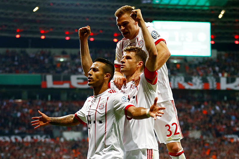 Bayern Munich's Thiago Alcantara celebrates scoring their fourth goal. Photo: Reuters