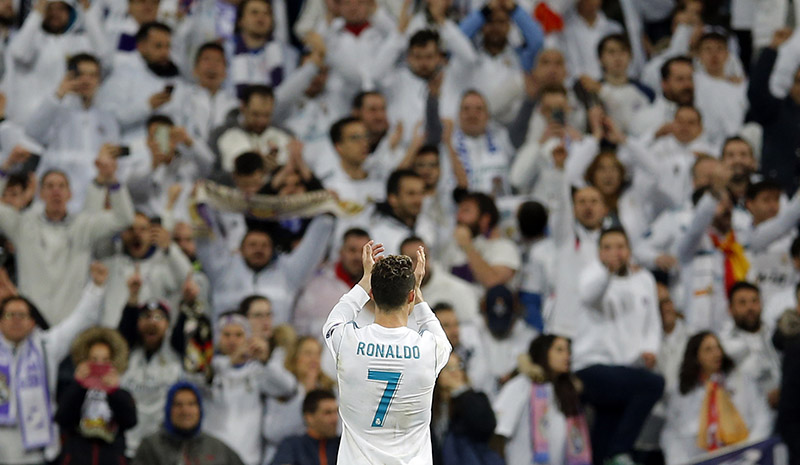 Real Madrid's Cristiano Ronaldo greets supporters at the end of a Champions League quarter-final, 2nd leg soccer match between Real Madrid and Juventus at the Santiago Bernabeu stadium in Madrid, Spain, on Wednesday, April 11, 2018. Photo: AP
