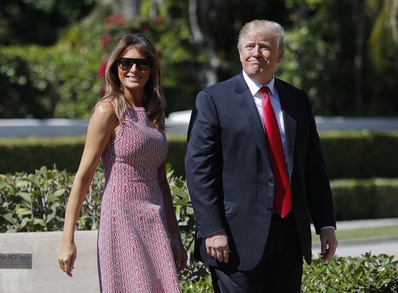 President Donald Trump and first lady Melania Trump arrive for Easter services at Episcopal Church of Bethesda-by-the-Sea in Palm Beach, Fla., on Sunday, April 1, 2018. Photo: APn
