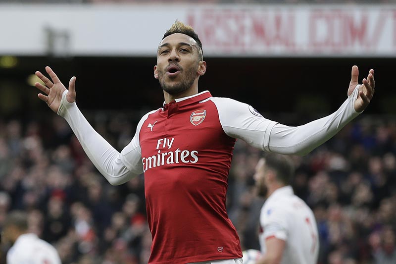 Arsenal's Pierre-Emerick Aubameyang celebrates after scoring a penalty during the English Premier League soccer match between Arsenal and Stoke City at the Emirates Stadium in London, on Sunday, April 1, 2018. Photo: AP