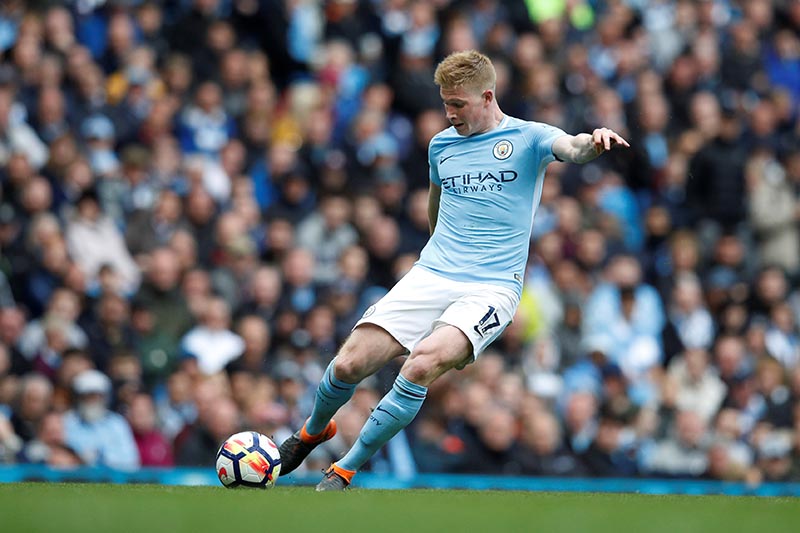 Manchester City's Kevin De Bruyne scores their third goal during the Premier League match between Manchester City and Swansea City, at Etihad Stadium, in Manchester, Britain, on April 22, 2018. Photo: Reuters