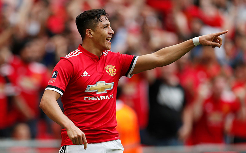 Manchester United's Alexis Sanchez celebrates scoring their first goal during the FA Cup Semi-Final match between Manchester United and Tottenham Hotspur, at Wembley Stadium, in London, Britain, on April 21, 2018. Photo: Action Images via Reuters