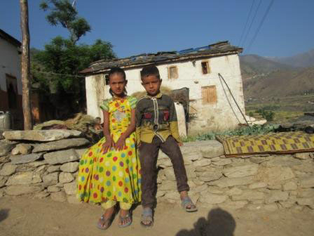 Seen in this photo are Samana Luwar (8) and Laxman Luwar (5), who were left with their grandfather with bare minimum livelihood support, in Kalshil of Budhinanda Municipality-5, in Bajura district, on April 26, 2018. Photo: Prakash Singh