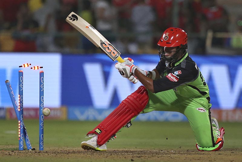 Royal Challengers Bangalore batsman Washington Sundar is bowled out by Rajasthan Royals Ben Stokes during the VIVO IPL Twenty20 cricket match in Bangalore, India, on Sunday, April 15, 2018. Photo: AP