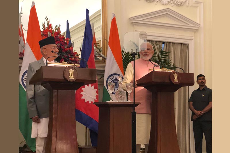 Prime Minister of Nepal KP Sharma Oli (left) and his Indian counterpart Narendra Modi addressing the press with bilateral talks in developmental cooperation, trade and investment, agriculture, energy, connectivity and people-to-people contacts, at Hyderabad House, in New Delhi, India, on Saturday, April 7, 2018. Photo: BishnuRimal/Twitter