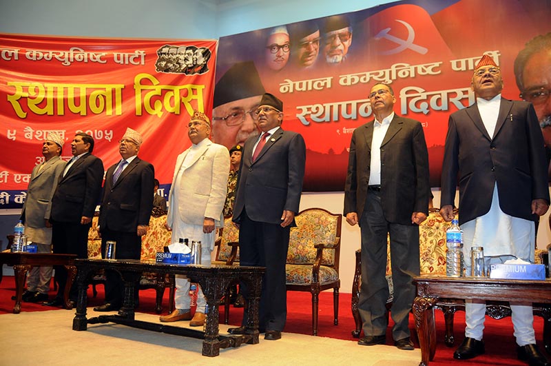 Prime Minister KP Sharma Oli and CPN-MC Chair Pushpa Kamal Dahal, along with other left alliance leaders, participating in a function to mark the 69th anniversary of the establishment of Nepal Communist Party, in Kathmandu, on Sunday, April 22, 2018. Photo: Balkrishna Thapa Chhetri/THT