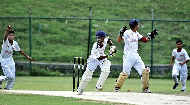 Action in the match between Province 1 (Batting) and Karnali during the Manmohan Memorial U-16 National Cricket Tournament at the TU Stadium in Kathmandu on Sunday. Photo: Naresh Shrestha/ THT