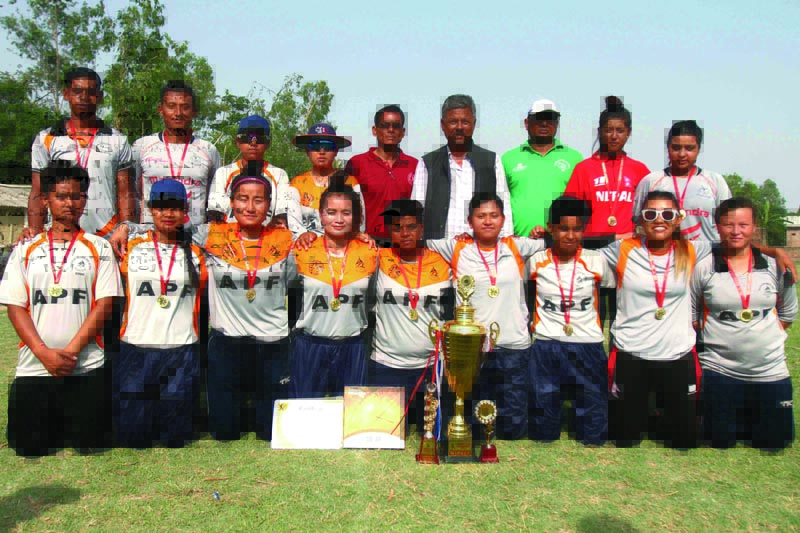 Players and officials of Nepal APF Club take group photo with Rajesh Ray Yadav (top line fourth from right) Mayor of Kalaiya Sub-Metorplitan City with winneru2019s trophy and cash prize during prize distribution ceremony of Kalaiya Cricket Leagu Women's T20 Cricket tournament at Siddeshwor Cricket Ground in Kalaiya, Bara on Saturday, April 21, 2018. Photo: Udipt Singh Chhetry