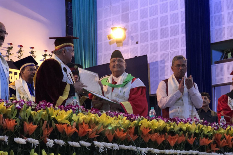 Chancellor of the Govind Ballab Pant University of Agriculture and Technology Krishnakant Paul conferring the Honorary Degree of Doctor of Science to Prime Minister KP Sharma Oli at a programme organised at the University in Uttarakhand, india, on Sudnay, April 8, 2018. Photo: Pradeep Gyawali's Twitter