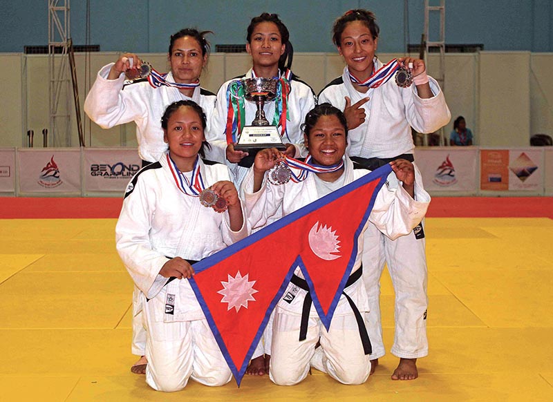 Nepali Judo team members pose for a photo after winning silver medal in the team event of the eight South Asian Judo Championship in Lalitpur on Monday, April 23, 2018. Photo: Udipt Singh Chhetry/ THT