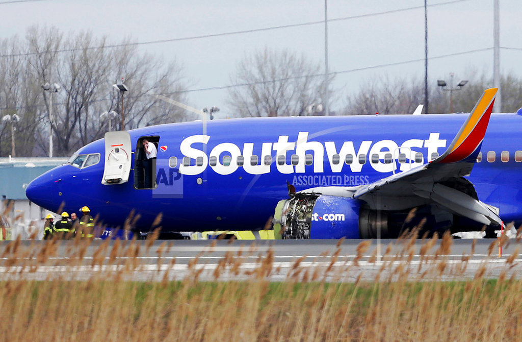 A Southwest Airlines plane sits on the runway at the Philadelphia International Airport after it made an emergency landing in Philadelphia, on Tuesday, April 17, 2018. Photo: Associated Press