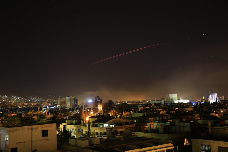 Explosions lit up the skies with anti-aircraft fire, over Damascus, the Syrian capital, as the US launches an attack on Syria targeting different parts of the Syrian capital Damascus, Syria, on early Saturday, April 14, 2018. Photo: AP