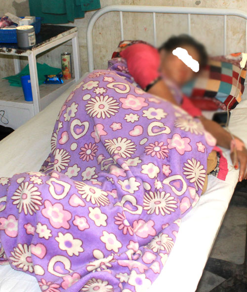 Victim of acid attack, Kalpana Shrestha, being treated at the Bharatpur Hospital, Chitwan, on Monday, April 23, 2017. Photo: Tilak Ram Rimal