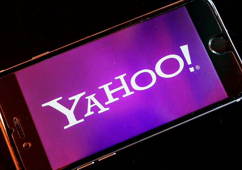 File - In this photo, the Yahoo logo appears on a smartphone in Frankfurt, Germany on Dec. 15, 2016. Photo: AP