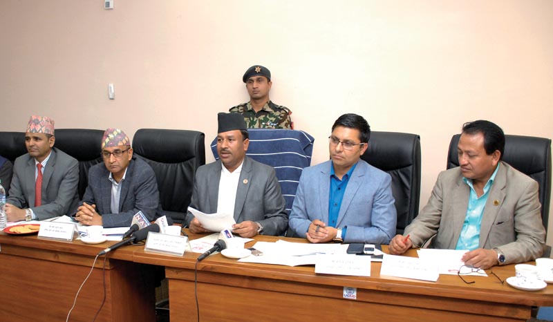 Youth and Sports Minister Jagat Bahadur Sunar (centre) speaks during a press meet in Kathmandu on Friday, April 6, 2018. Photo: THT
