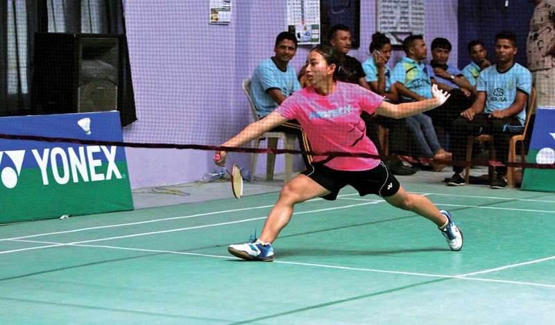 Jessica Gurung returns to Nangsal Devi Tamang during their seventh Pushpalal Memorial National Badminton Tournament match at the Itahari Badminton Club courts on Friday, May 11, 2018. Photo: THT