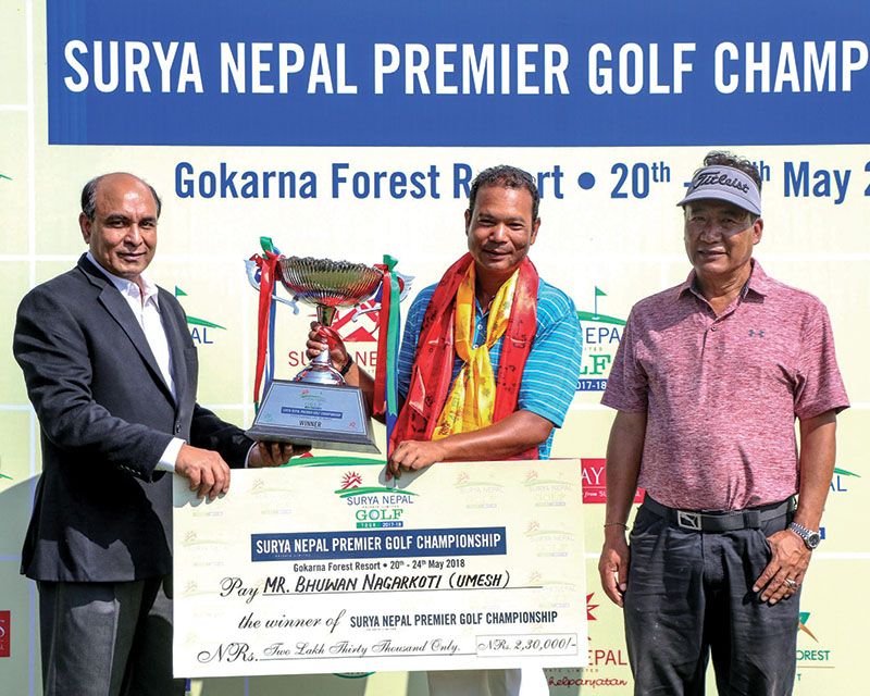 Bhuwan Nagarkoti receiving the trophy from Surya Nepal Pvt Ltd Managing Director Abhimanyu Poddar (left) as NGA President Tashi Ghale looks on after the Surya Nepal Premier Golf Championship at the Gokarna Golf Club on Thursday. Photo: THT