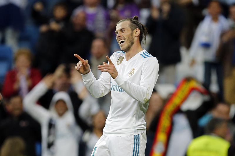 Real Madrid's Gareth Bale celebrates after scoring his side's 2nd goal during a Spanish La Liga match between Real Madrid and Celta at the Santiago Bernabeu stadium,  Madrid, Spain, on Saturday, May 12, 2018. Photo: Associated Press