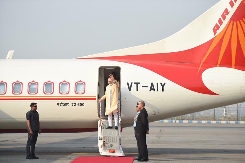 Indian Prime Minister Narendra Modi waving before taking flight to Nepal, in India, on Friday, May 11, 2018. Photo: MEA India twitter