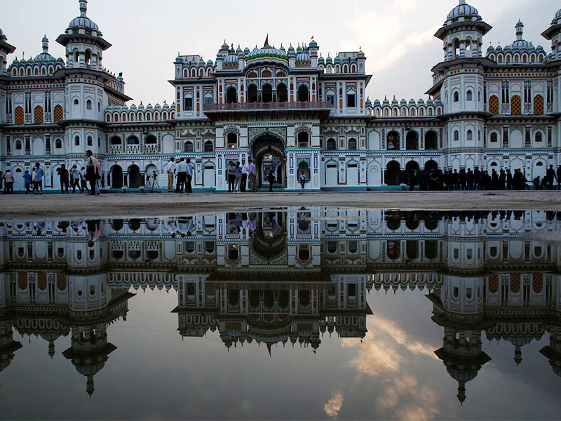 Janaki Mandir, a Hindu temple dedicated to goddess Sita, which India's Prime Minister Narendra Modi is scheduled to visit on Friday, is reflected in a puddle, in Janakpur, Nepal May 10, 2018. Photo: Reuters
