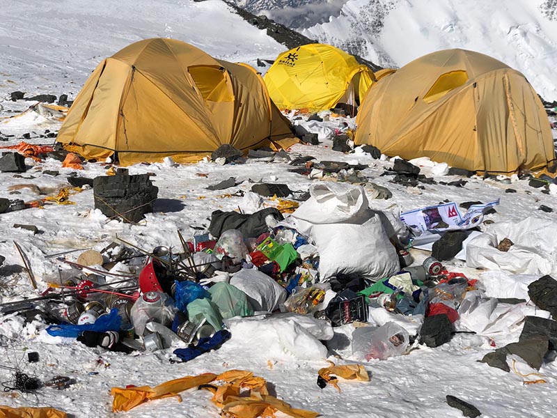 Bags full of human waste, tents and garbage left behind by climbers above Camp II on Mt Everest. Photo courtesy: David Liaño