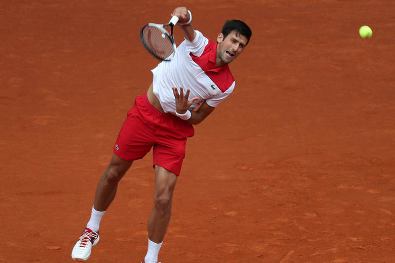 Serbia's Novak Djokovic in action during his first round match against Japan's Kei Nishikori. Photo: Reuters