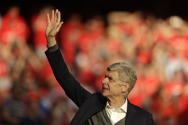 Arsenal's French manager Arsene Wenger waves to spectators during a lap of honor after the match between Arsenal and Burnley at the Emirates Stadium in London, on Sunday, May 6, 2018. Photo: AP