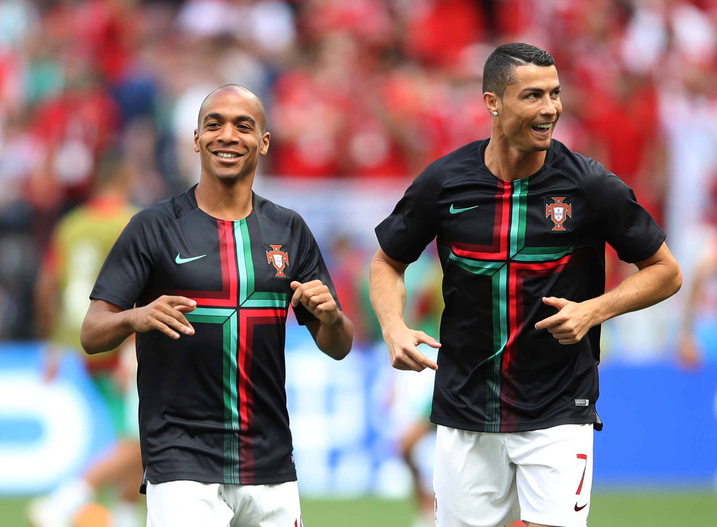 Soccer Football - World Cup - Group B - Portugal vs Morocco - Luzhniki Stadium, Moscow, Russia - June 20, 2018   Portugal's Joao Mario and Cristiano Ronaldo during the warm up before the match. Photo: REUTERS