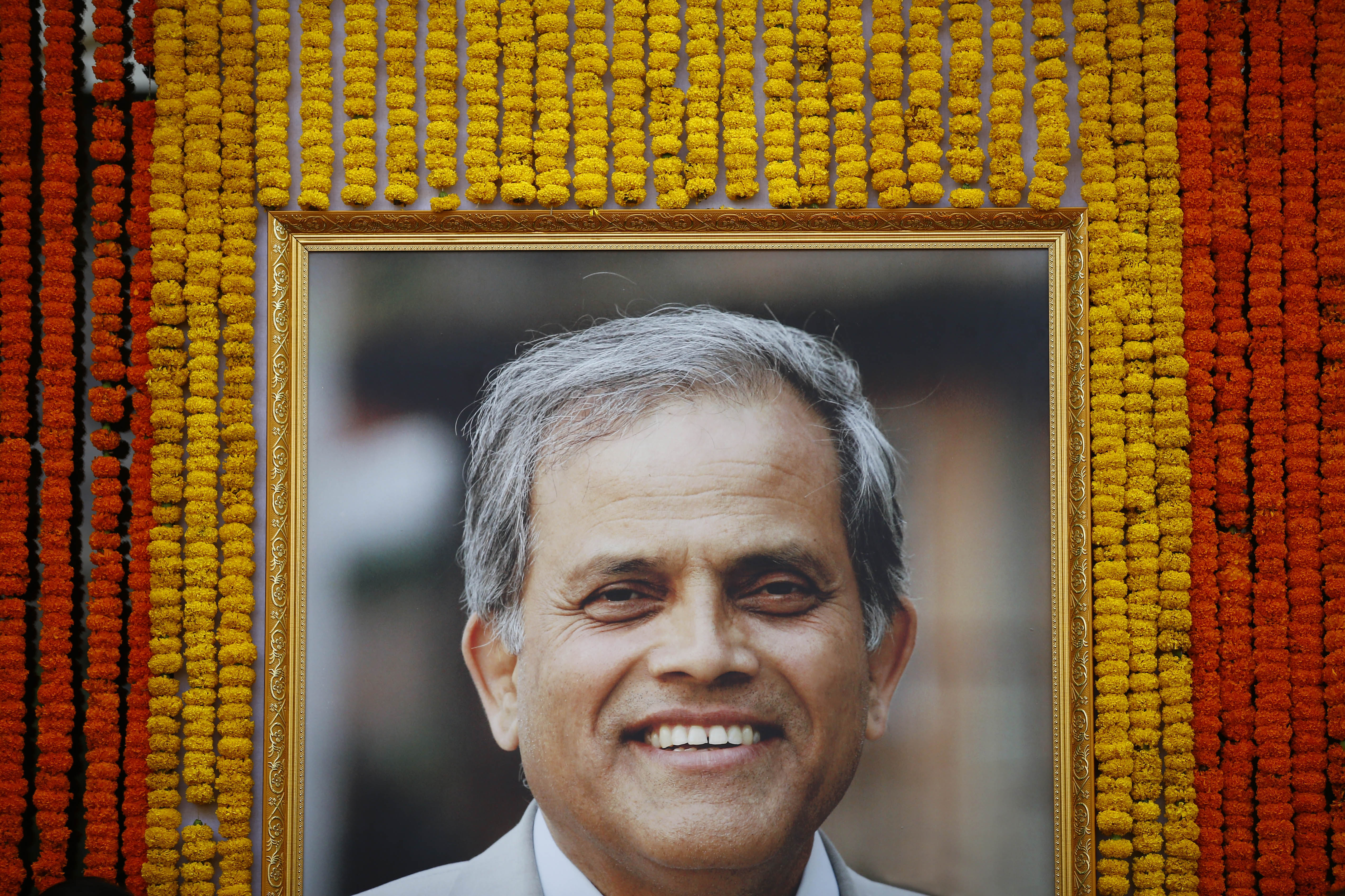A portrait of the renowned neurosurgeon Dr Upendra Devkota, pictured at the Neuro Hospital in Kathmandu where people from all walks gathered to pay their final respects, on Tuesday, June 19, 2018. He passed away at the age of 64 after suffering from bile duct cancer. Photo/Skanda Gautam