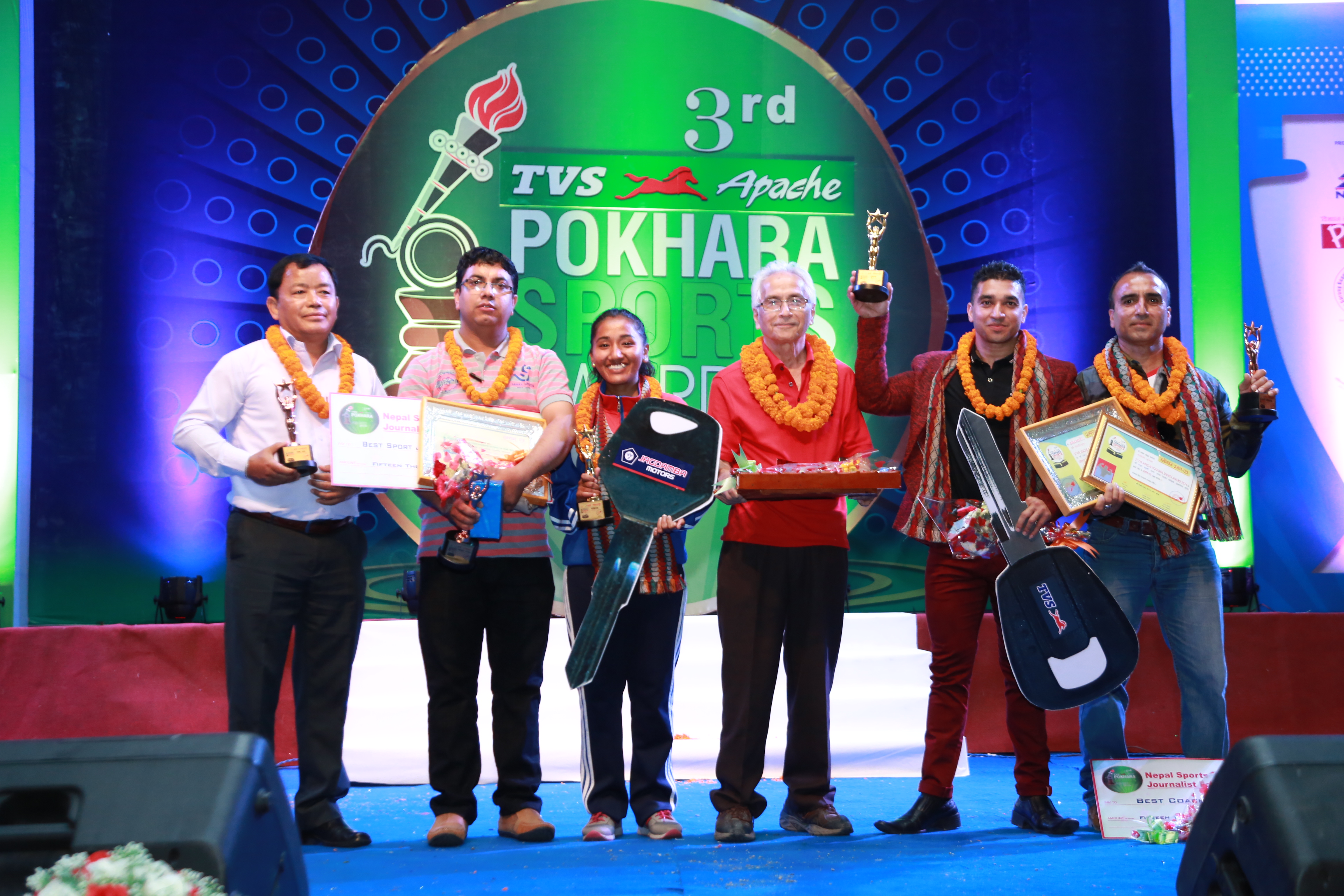 Winners of the third TVS Apache Pokhara Sports Award pose for a group photo in Kaski on Friday, June 1, 2018. Photo: THT