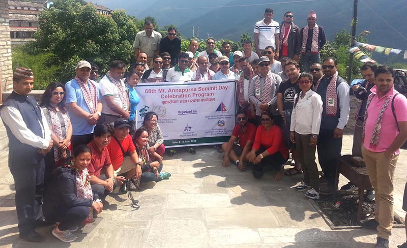 A view of guests posing for group photograph while observing the 68th Annapurna Summit Day in Lwang of Machhapuchchhre Rural Municipality, Kaski, on Sunday, June 3, 2018. Photo: THT