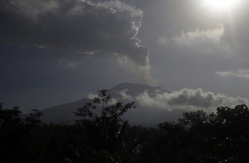 Mount Agung volcano spews smoke, seen in Karangasem, Bali, Indonesia on Friday, June 29, 2018. Photo: AP