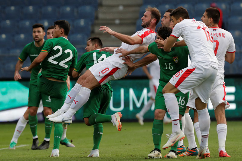 Soccer Football - International Friendly - Serbia vs Bolivia - Merkur-Arena, Graz, Austria - June 9, 2018   Serbia's Branislav Ivanovic in action with Bolivia's Leonel Justiniano and Jose Segredo    REUTERS/Heinz-Peter Bader