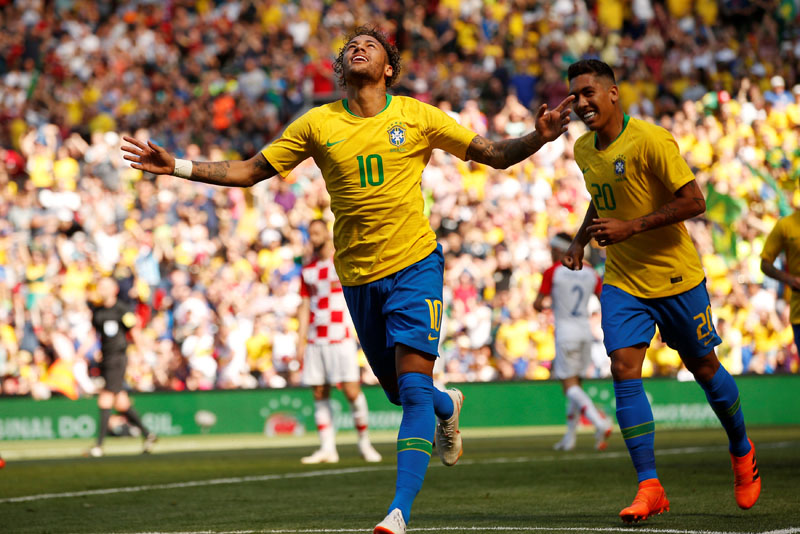 Soccer Football - International Friendly - Brazil vs Croatia - Anfield, Liverpool, Britain - June 3, 2018   Brazil's Neymar celebrates scoring their first goal with Roberto Firmino   REUTERS/Andrew Yates