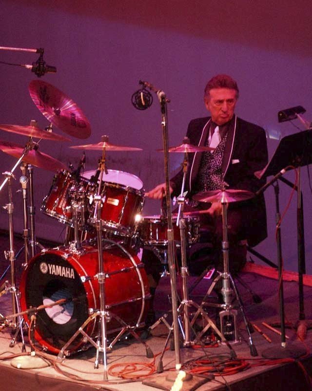 File- In this photo, longtime Elvis Presley drummer D.J. Fontana performs at the 50th anniversary celebration concert of Elvis Presleyu2019s first performance at the Louisiana Hayride in Sherveport, LA on Oct. 16, 2004. Photo: AP 