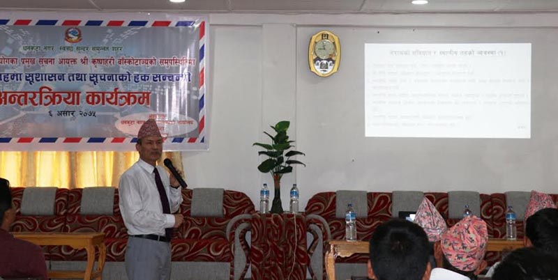 Chief Commissioner Krishna Hari Banskota of the Information Commission facilitating local representatives at an awareness programme on right to information, in Dhankuta, on Wednesday, June 20, 2018. Photo: THT